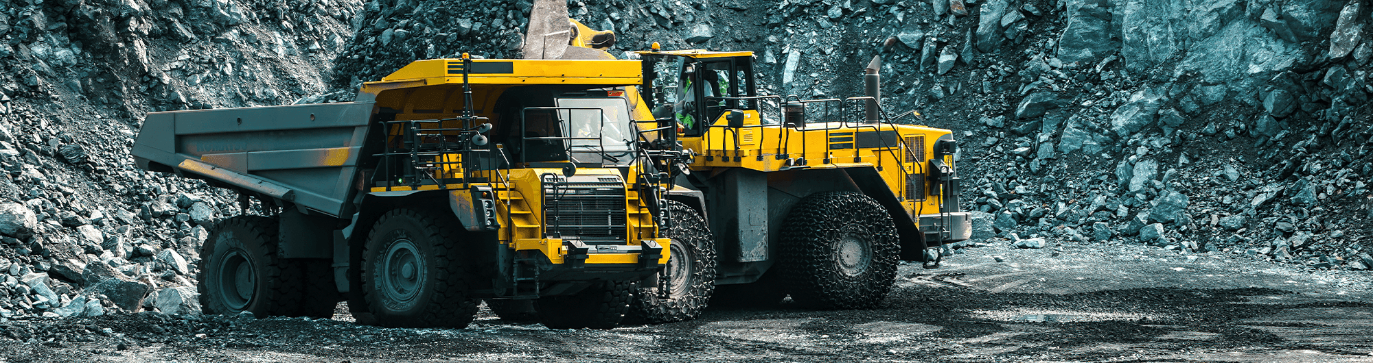 mineração azul máquinas amarelas