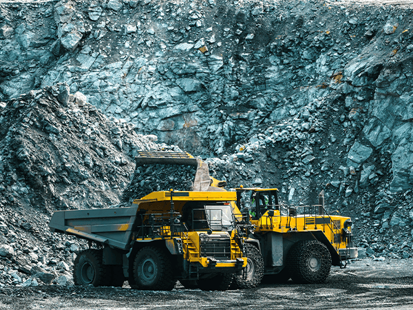mineração azul máquinas amarelas