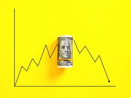 nota de dólar em frente gráfico indicando queda fundo amarelo